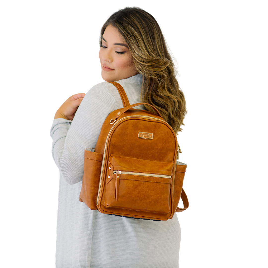 Itzy Ritzy - Cognac Itzy Mini™ Diaper Bag Backpack